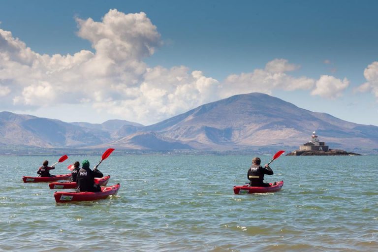 People kayaking in Tralee Bay